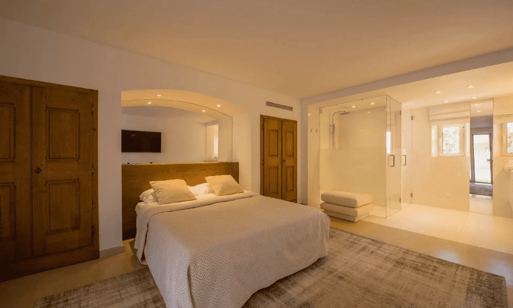 Spa-inspired bathroom with marble and glass features